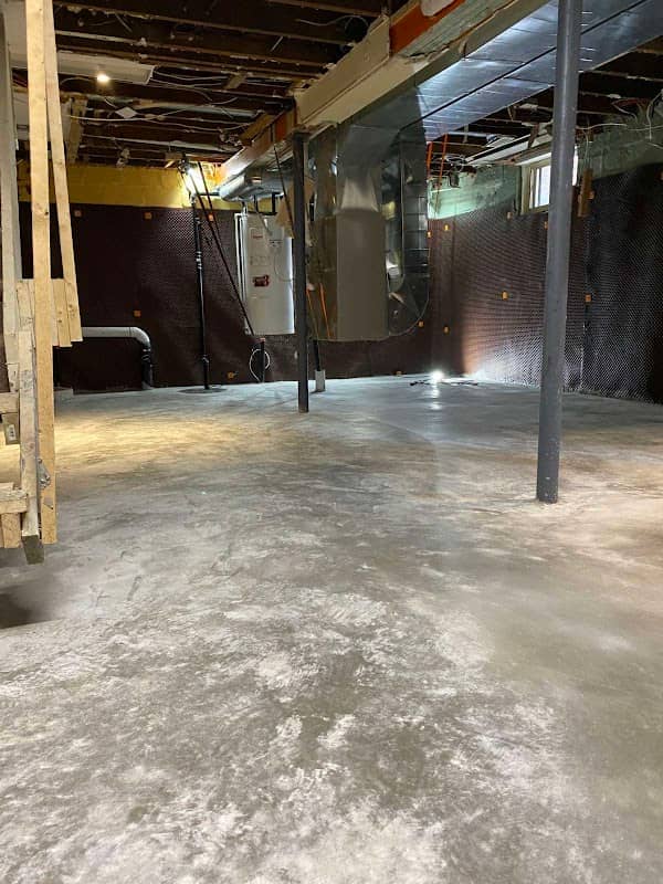 Basement Underpinning and Lowering: concrete work photographed at the business